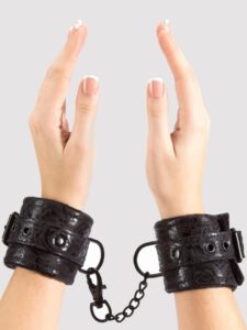 Bondage Boutique Black Rose Faux Fur Lined Wrist Cuffs - Black